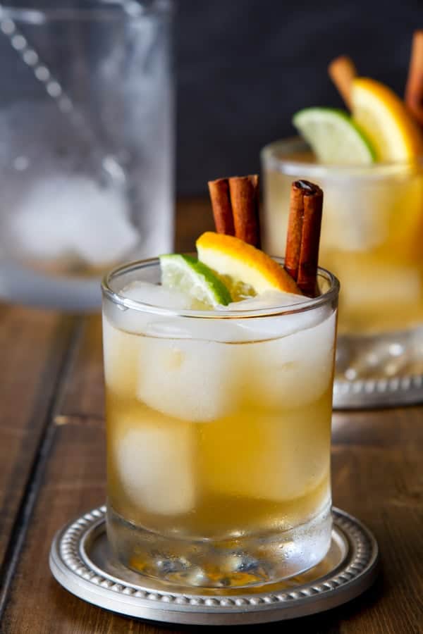 Two glasses of a citrus and spice kentucky mule cocktail 