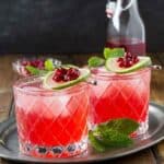 The holidays call for festive cocktails and what better way to welcome your guests then with this Pomegranate Lime Gin Fizz.
