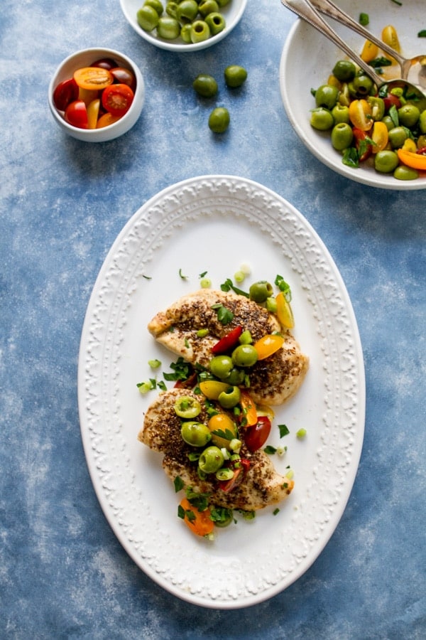 Sweet, salty and a little sour, this Green Olive, Tomato and Pomegranate Salad can double as an appetizer, main course or snack!