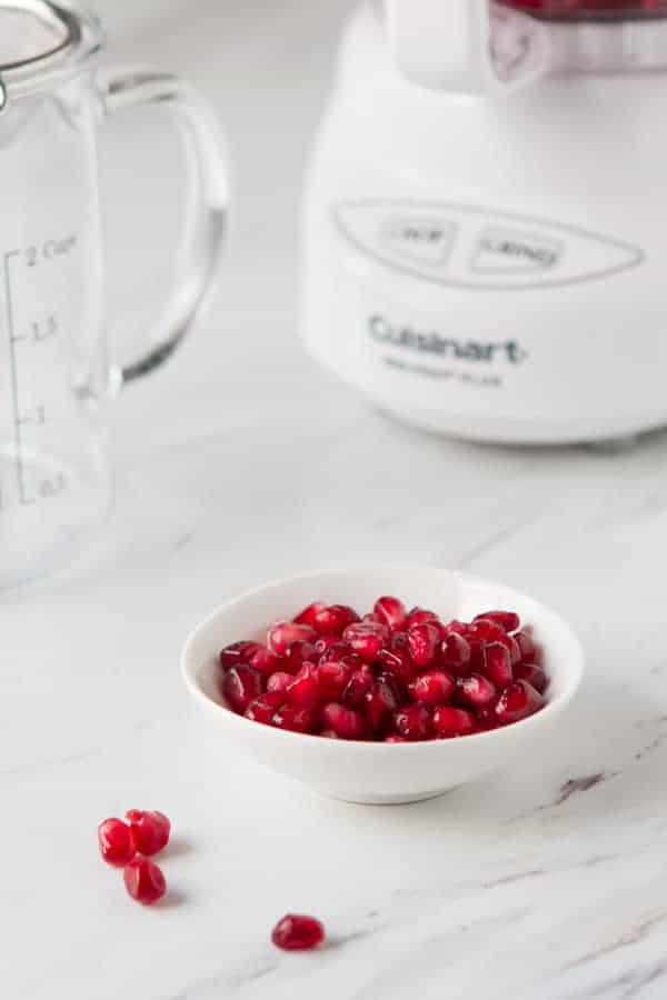 fresh pomegranate arils in a dish. 