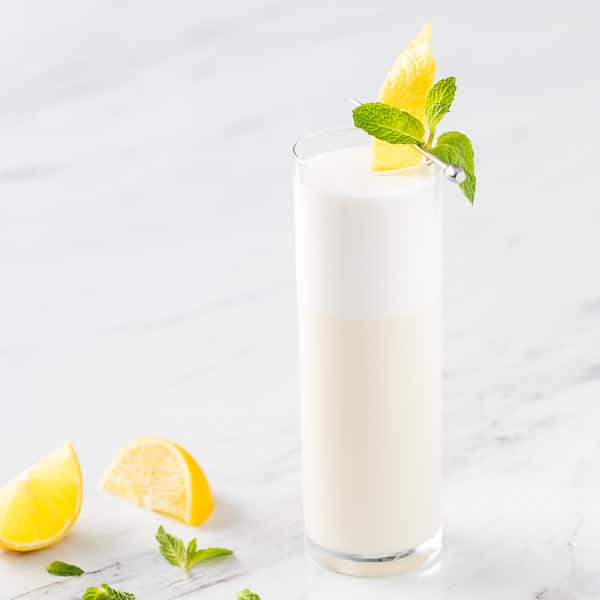 Close up photo of the Italian drink, Sgroppino in a glass showing the separation of ingredients.
