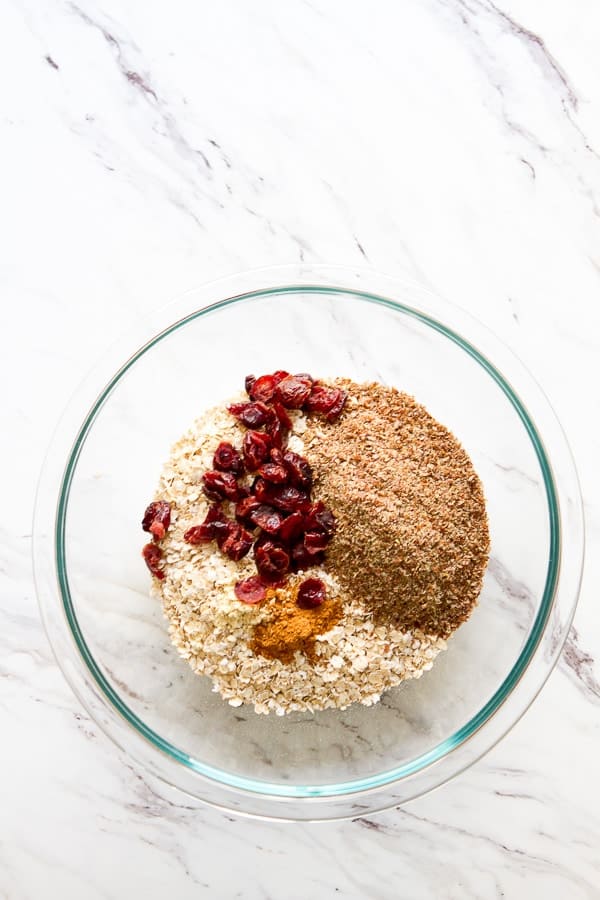 bowl of oatmeal, flax,spices and dried cranberries