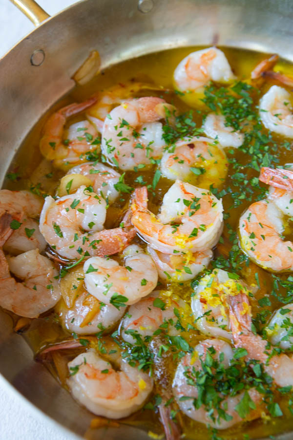 step #4 - Pan with shrimp in garlic sauce with parsley and lemon zest. 