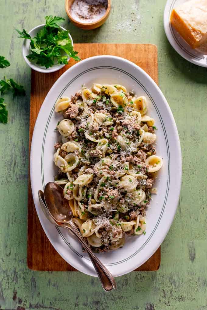 A large platter with lemon caper turkey pasta orecchiette recipe. 