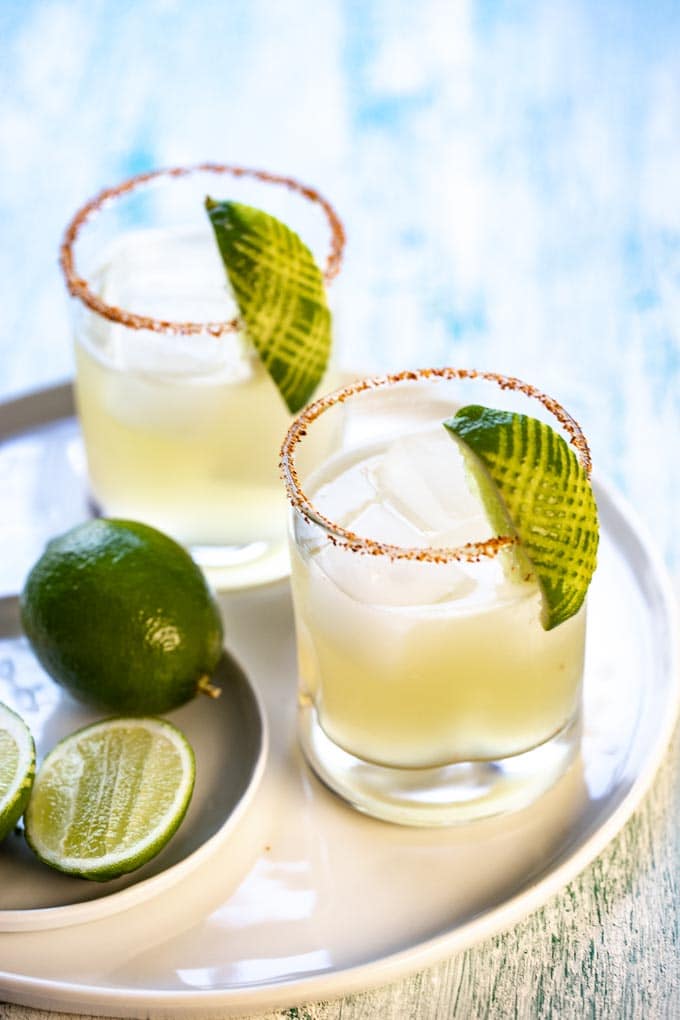 two glasses of a simple margarita recipe on a white tray. 
