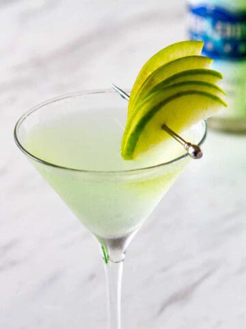 Single glass of apple martini.